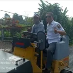 Peningkatan Pengaspalan Jalan Desa Sepanjang 320 Meter